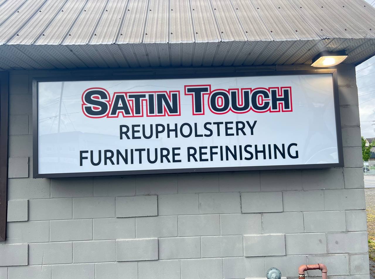 Signboard for 'Satin Touch' business