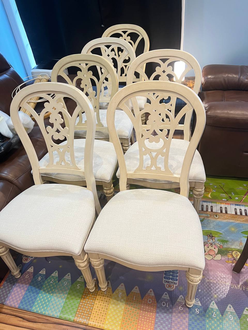 6-piece set French Provincial-inspired dining chair with a cream ornate carved backrest and white upholstered seat