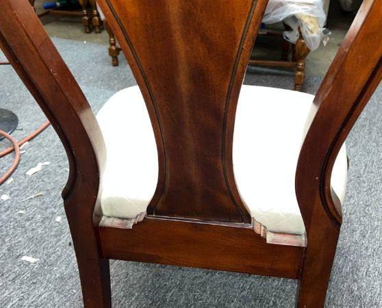 Wooden dining chair with cream tufted cushion and cabriole legs