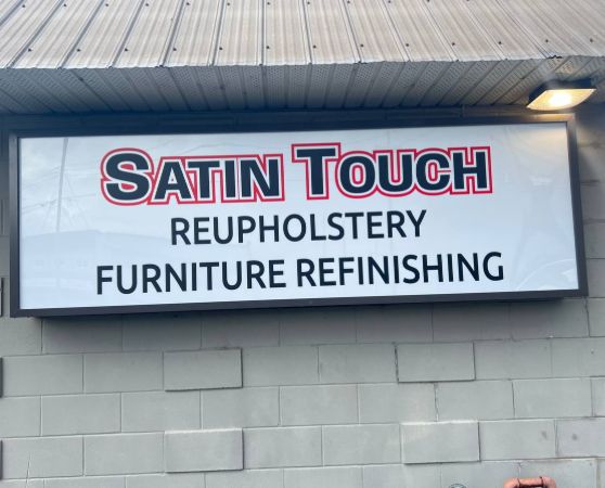 Signboard for 'Satin Touch' business