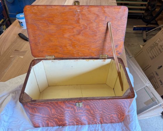 Refinished vintage wooden chest with reddish-brown finish and metal clasp