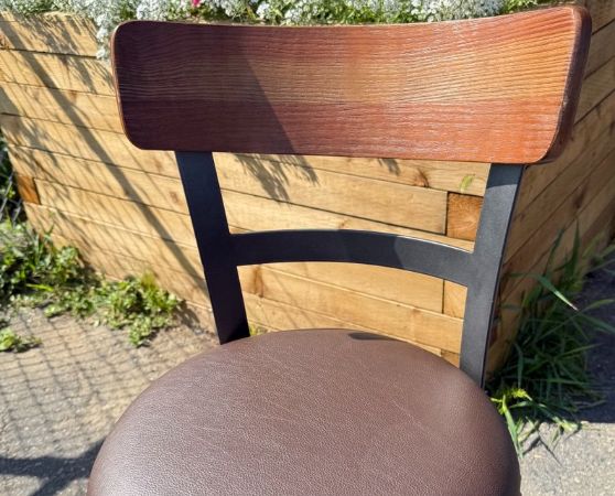 Bar stool reupholstered in chocolate brown vinyl with a new cushion