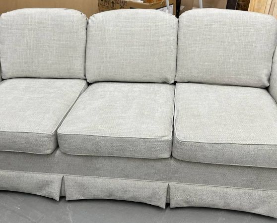 Reupholstered Three-cushion Sofa with a Skirted Base in light grey fabric
