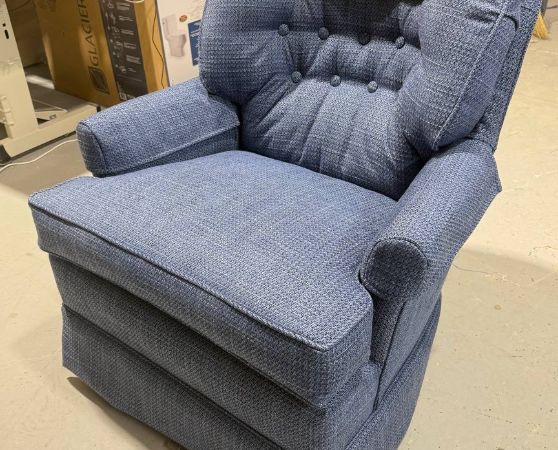 Reupholstered Tufted Swivel Rocking Chair with a skirted base in blueberry fabric