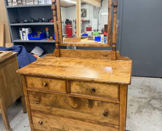 Front of Refinished Vintage 4 Drawer Dresser with Mirror in light brown stain
