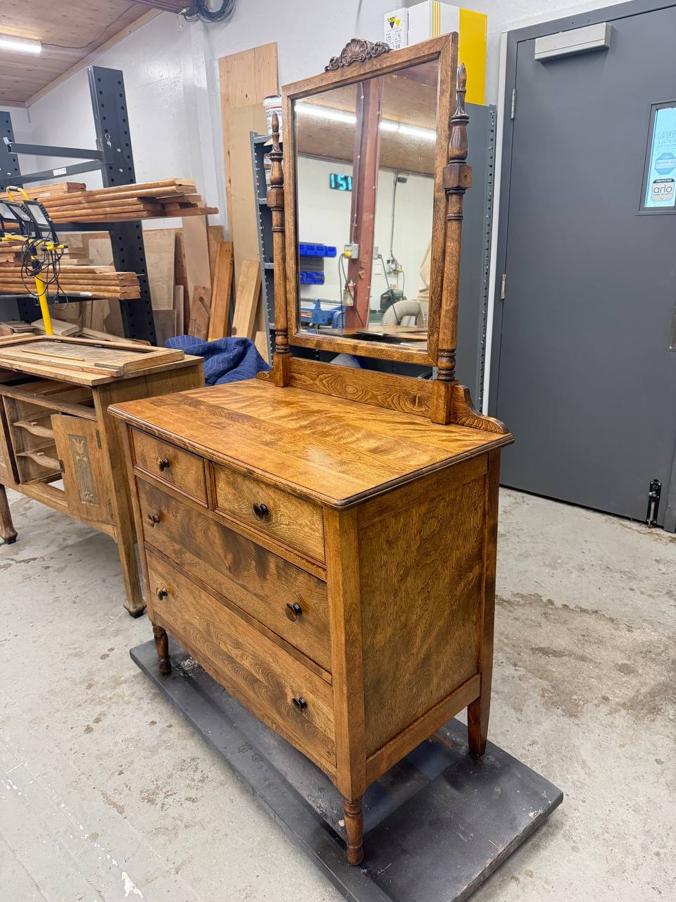 Side of Refinished Vintage 4 Drawer Dresser with Mirror in light brown stain
