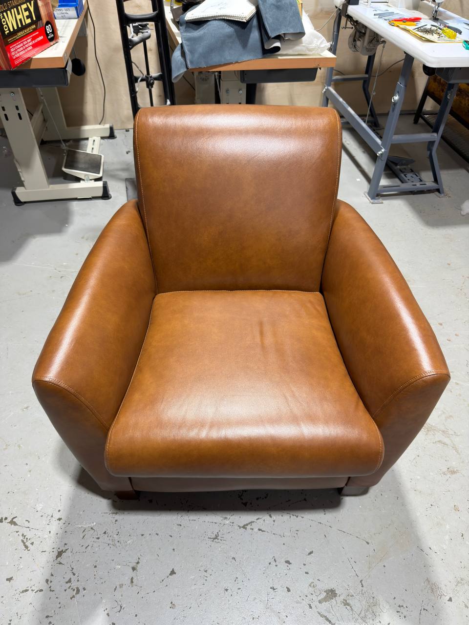 Front of Reupholstered Leather Club Chair in Brown Leather