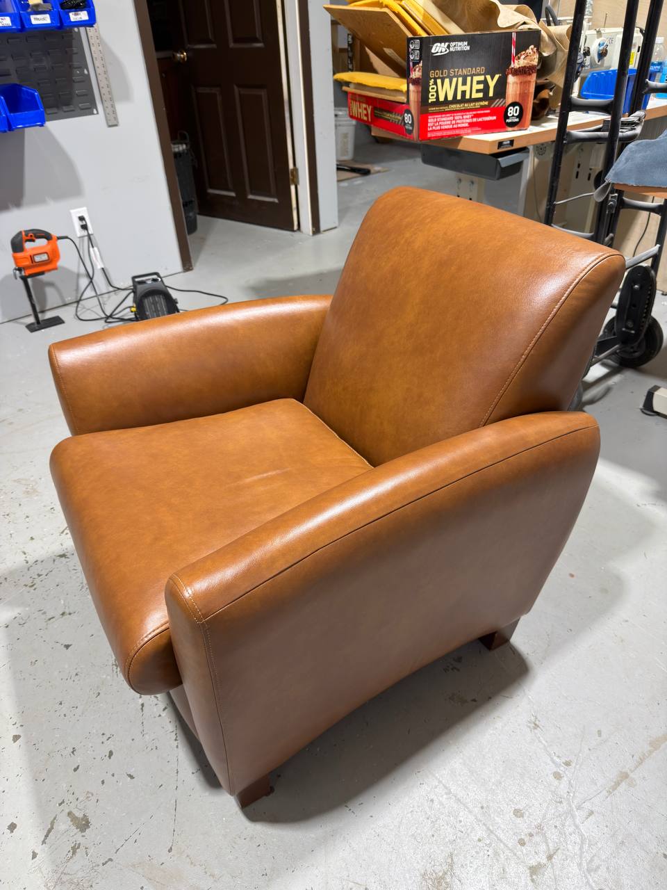 Side of Reupholstered Leather Club Chair in Brown Leather