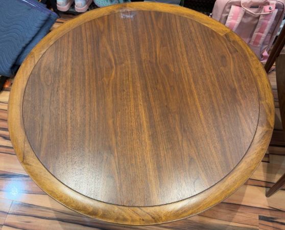Top of Refinished Mid-century Modern Round Walnut Coffee Table stained in Dark Walnut danish oil