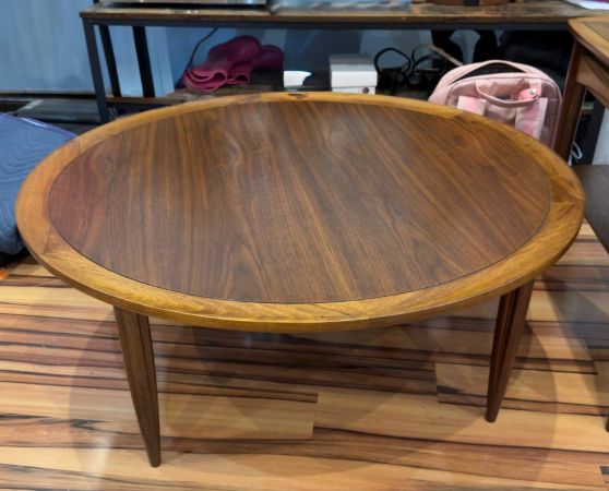 Side of Refinished Mid-century Modern Round Walnut Coffee Table stained in Dark Walnut danish oil