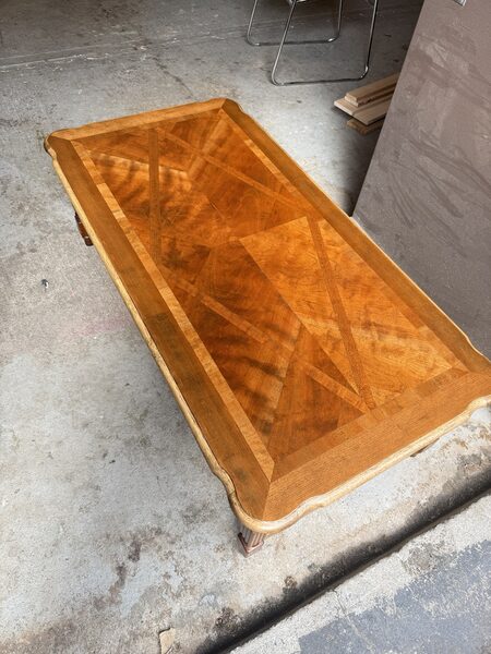 Refinished rectangular coffee table with a warm amber geometric veneer top